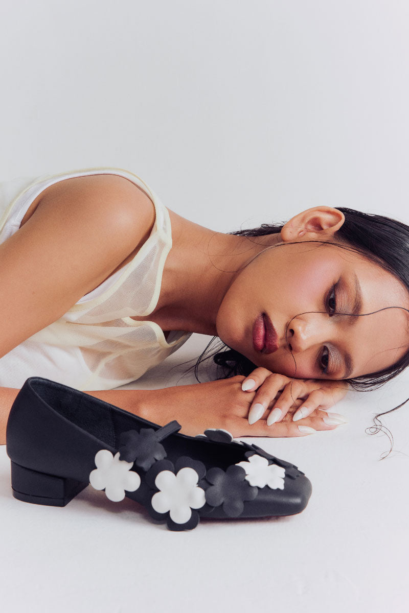 Christin Wu YARDENE heels styled with a fashionable outfit, showing the elegant design and heel height on a lifestyle background.
