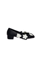 Christin Wu Yardene heels featuring a sleek design and pointed toe, displayed on a neutral background.