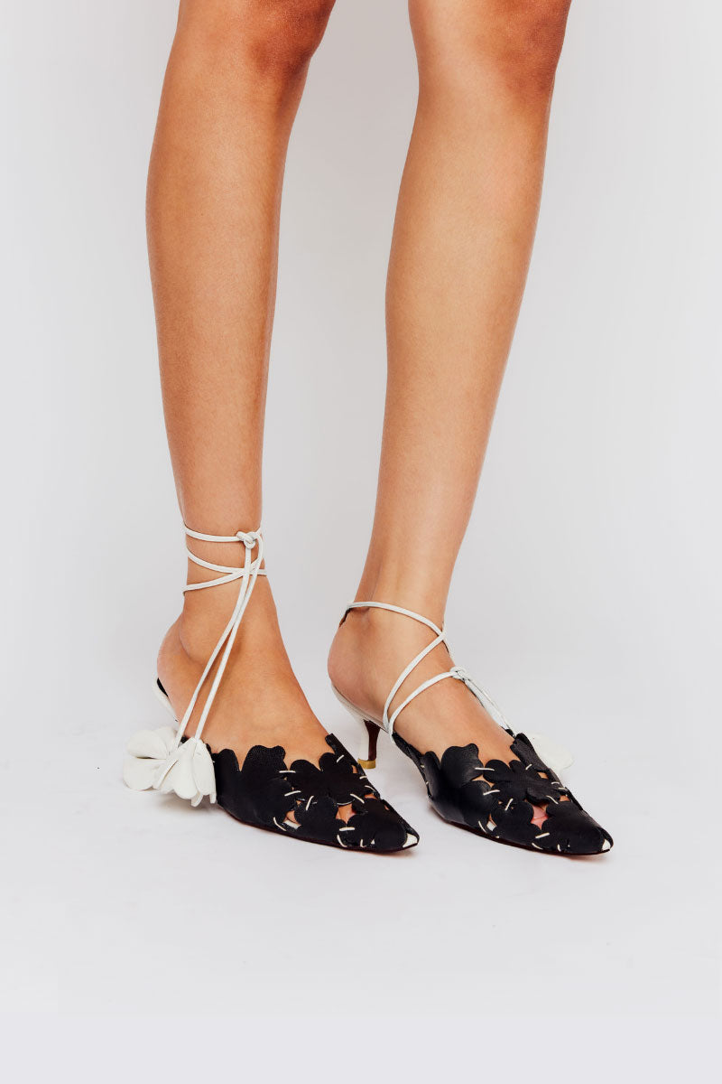 Pair of Christin Wu YASELLE heels featuring elegant design and stylish heel height, perfect for formal or evening wear.