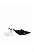 Side view of Christin Wu YASELLE heels showcasing stylish high-heeled footwear with a sleek design.