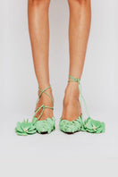 Christin Wu Yeesha heels featuring elegant design and pointed toes, displayed on a neutral background.
