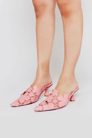 Pair of Christin Wu YEMIMA heels featuring elegant design and pointed toes, showcased on a neutral background.