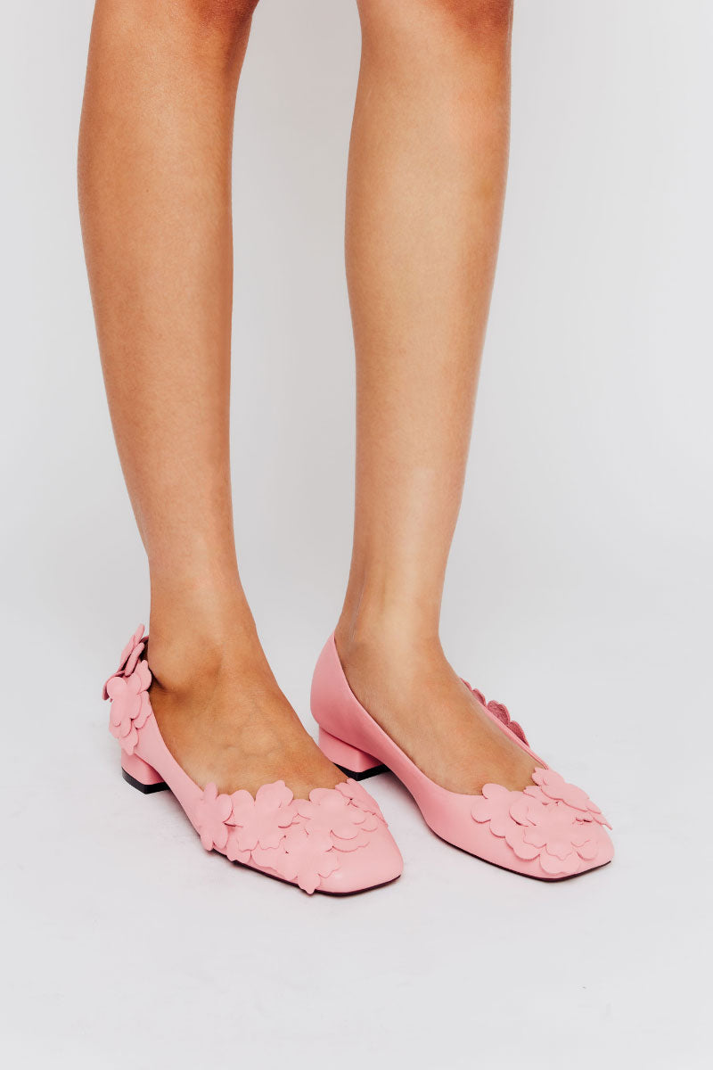 Pair of Christin Wu YESSY heels featuring elegant pointed toes and sleek design, perfect for stylish occasions.