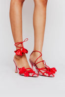 Elegant black YICHELLE heels by Christin Wu featuring sleek design and pointed toes, perfect for formal or evening wear.