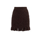 Brown Yara mini skirt by Maylé Vásquez, stylish short skirt with a fitted waistband and smooth fabric.
