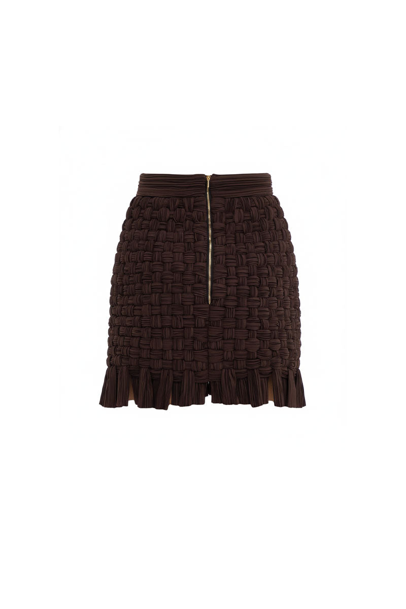 Brown Yara Mini Skirt by Maylé Vásquez, stylish and fitted, displayed on a neutral background showing the skirt's details.