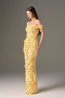 Yellow floral lace off-shoulder gown by I.H.F Studio with elegant garden-inspired design and flowing fabric.