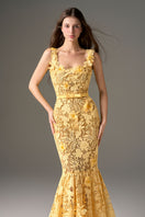 Yellow floral garden maxi dress by I.H.F Studio featuring a mermaid silhouette and sleeveless design.