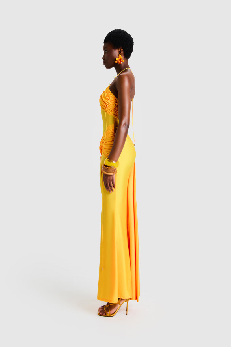 Yellow maxi dress by BBXBRAND with a sweet pineapple print, flowing fabric, and sleeveless design.