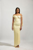 Yellow maxi dress by Deme By Gabriella, featuring a flowing silhouette and elegant design, shown in this image.