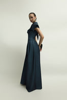 Dark blue Zelie jumpsuit by Jenny K Tran, featuring a stylish, tailored design, shown on a model with a relaxed fit and elegant silhouette.