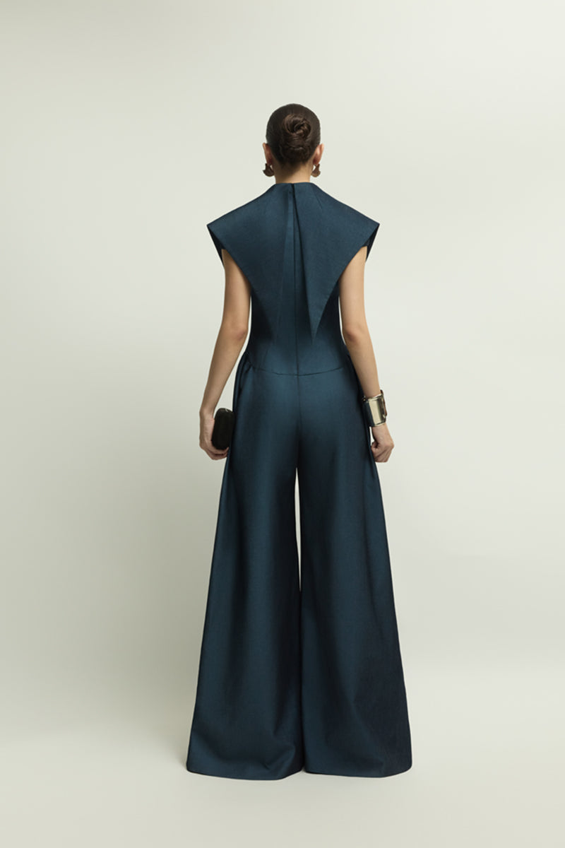 Dark blue Zelie jumpsuit by Jenny K Tran, stylish one-piece outfit with a fitted silhouette and sleeveless design.