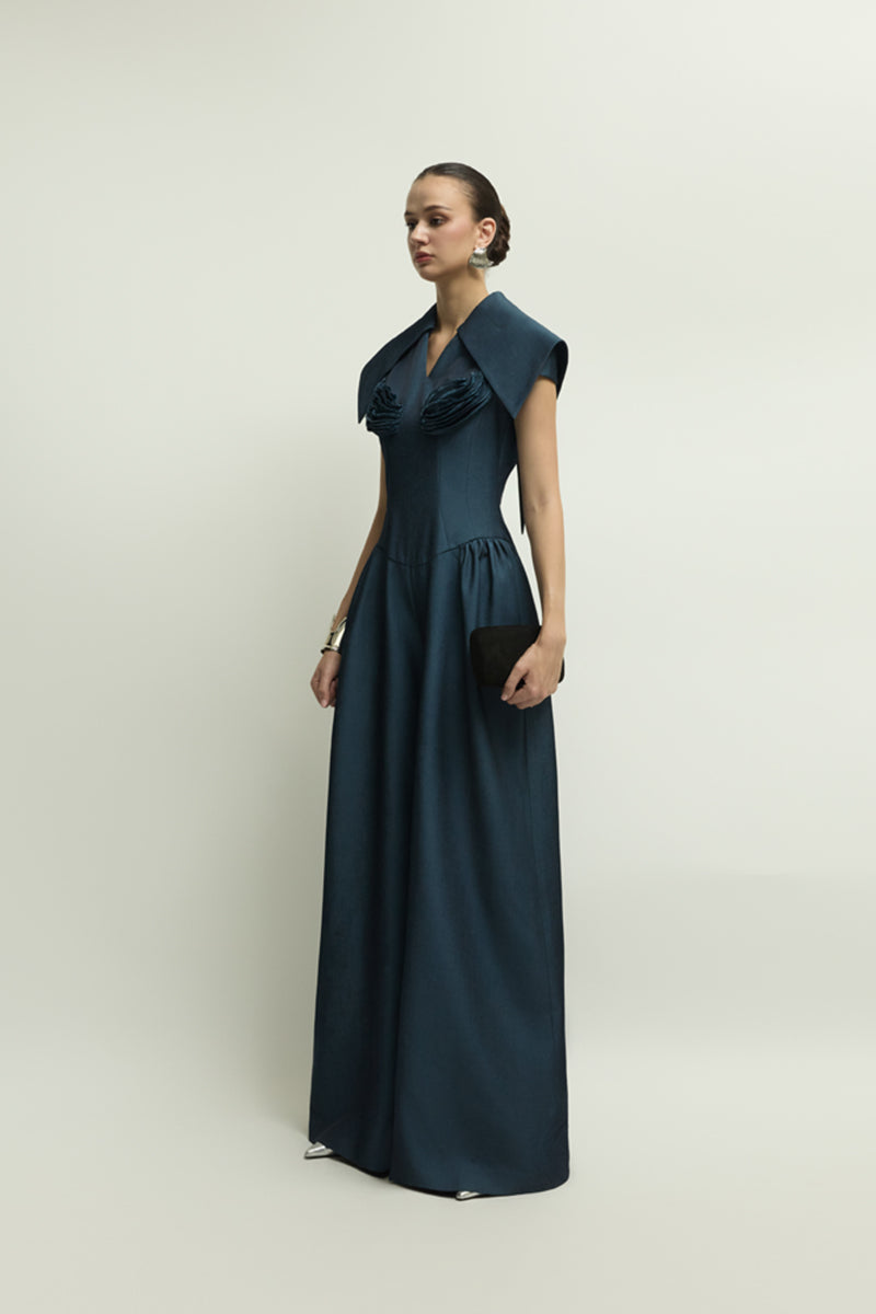 Dark blue Zelie jumpsuit by Jenny K Tran, featuring a stylish, tailored design with wide-leg pants and a fitted bodice.