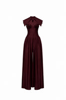 Jenny K Tran Zelie jumpsuit in burgundy, featuring a stylish, fitted design with long sleeves and a sleek, elegant silhouette.