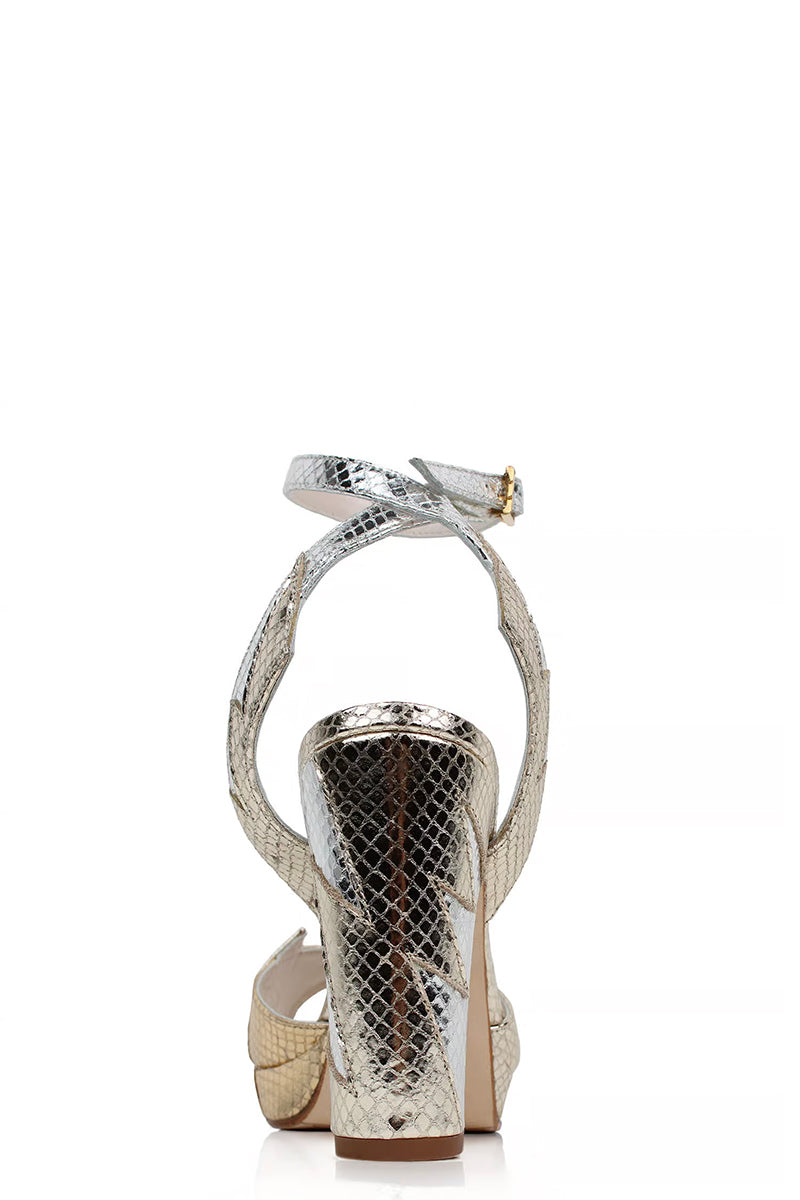 Gold Terry de Havilland Zia mid heels with sleek design and pointed toes, shown from a side angle.