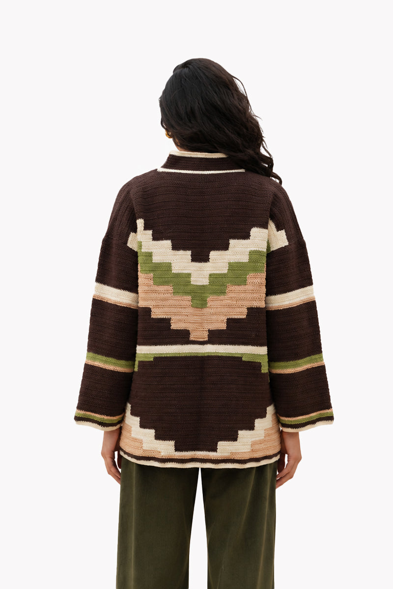 Jessica K ZINA brown cardigan jacket displayed on a model, featuring a cozy fit and front button closure.