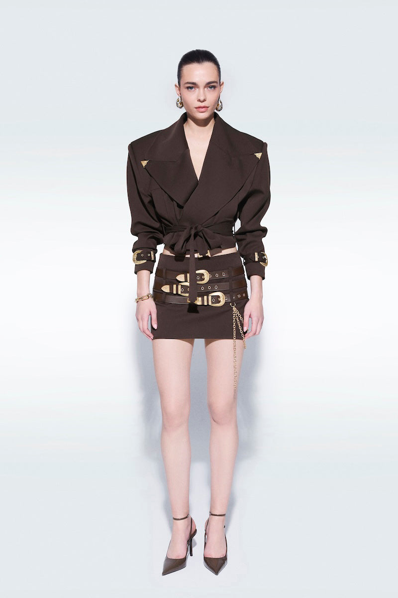 Brown oversized mini trench jacket by Zeynep Tosun, featuring classic collar and button details, styled for a modern look.