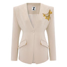 Beige Zeynep Tosun sea shell jacket with front view, stylish design, and textured fabric, perfect for a chic outerwear look.