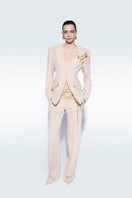 Beige sea shell jacket by Zeynep Tosun, showcasing elegant design and tailored fit in a stylish outerwear piece.