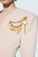 Beige sea shell jacket by Zeynep Tosun, stylish lightweight jacket with shell-inspired design and elegant details.