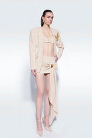 Beige sea shell jacket by Zeynep Tosun featuring a stylish, textured design, perfect for a chic, modern look.
