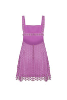 Pink strapless mini dress by Zeynep Tosun with detailed corset design, shown from the back.