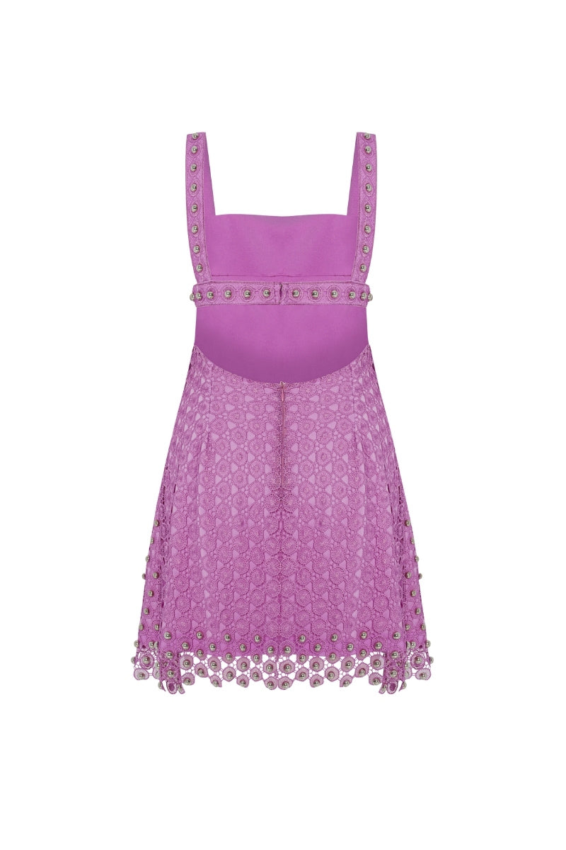 Pink strapless mini dress by Zeynep Tosun with detailed corset design, shown from the back.