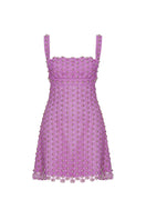 Pink strapless mini dress by Zeynep Tosun featuring intricate corset detailing and a fitted silhouette.