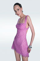 Pink strapless mini dress by Zeynep Tosun featuring detailed corset design, fitted silhouette, and elegant style.