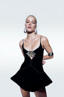 Black Rose and Thorns mini dress by Zeynep Tosun, featuring a fitted silhouette and intricate floral detailing.