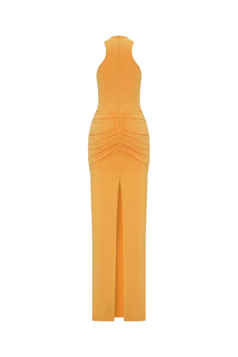 Back view of Zeynep Tosun Sun Chaser yellow maxi dress with flowing fabric and elegant design.