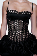 Black Broderie midi dress by Zeynep Tosun featuring intricate embroidery and a stylish, elegant silhouette.
