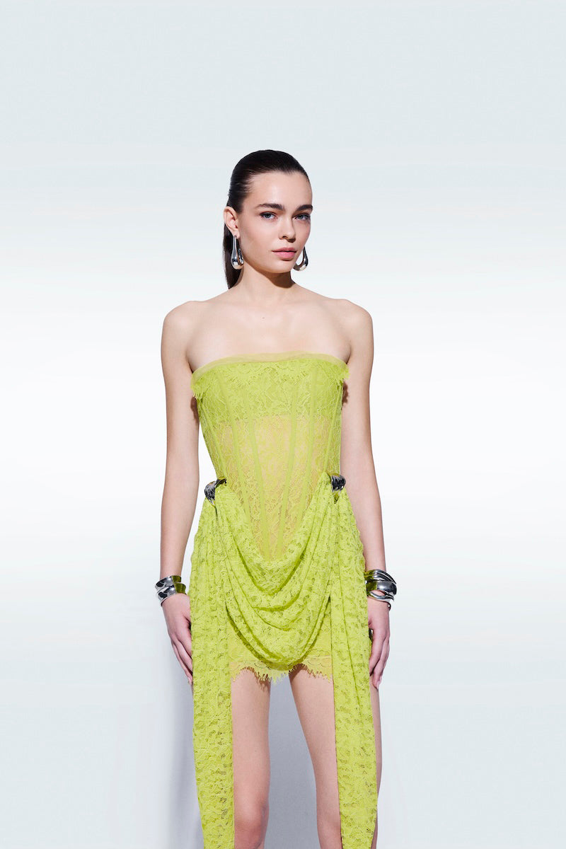 Zeynep Tosun lime strapless corset mini dress, fitted bodice with structured design, sleeveless style, on a mannequin.