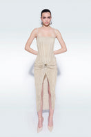 Beige strapless corset midi dress by Zeynep Tosun, featuring fitted bodice and flowing skirt, styled for elegant occasions.