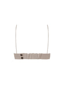 Zeynep Tosun beige gabardin bras top shown from the back, featuring sleek fabric and stylish design details.