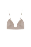 Beige gabardine bra top by Zeynep Tosun with structured design and soft fabric, shown from the front.