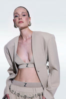 Beige gabardine bra top by Zeynep Tosun featuring a fitted design and subtle texture, suitable for stylish casual wear.
