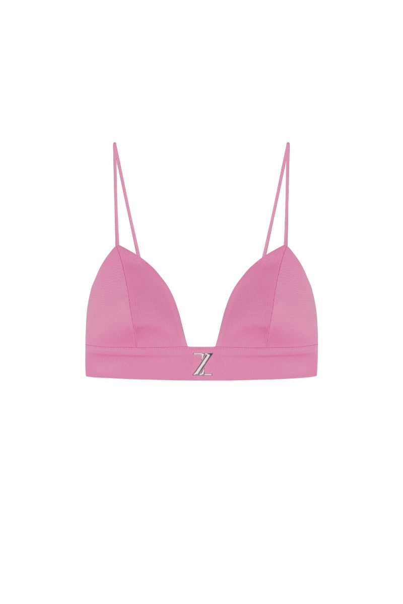 Pink gabardin bra top by Zeynep Tosun, featuring a fitted design and subtle detailing, shown from the front.