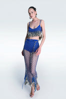 Hand-knitted blue top by Zeynep Tosun, featuring intricate knit pattern and cozy fit, perfect for casual or stylish wear.