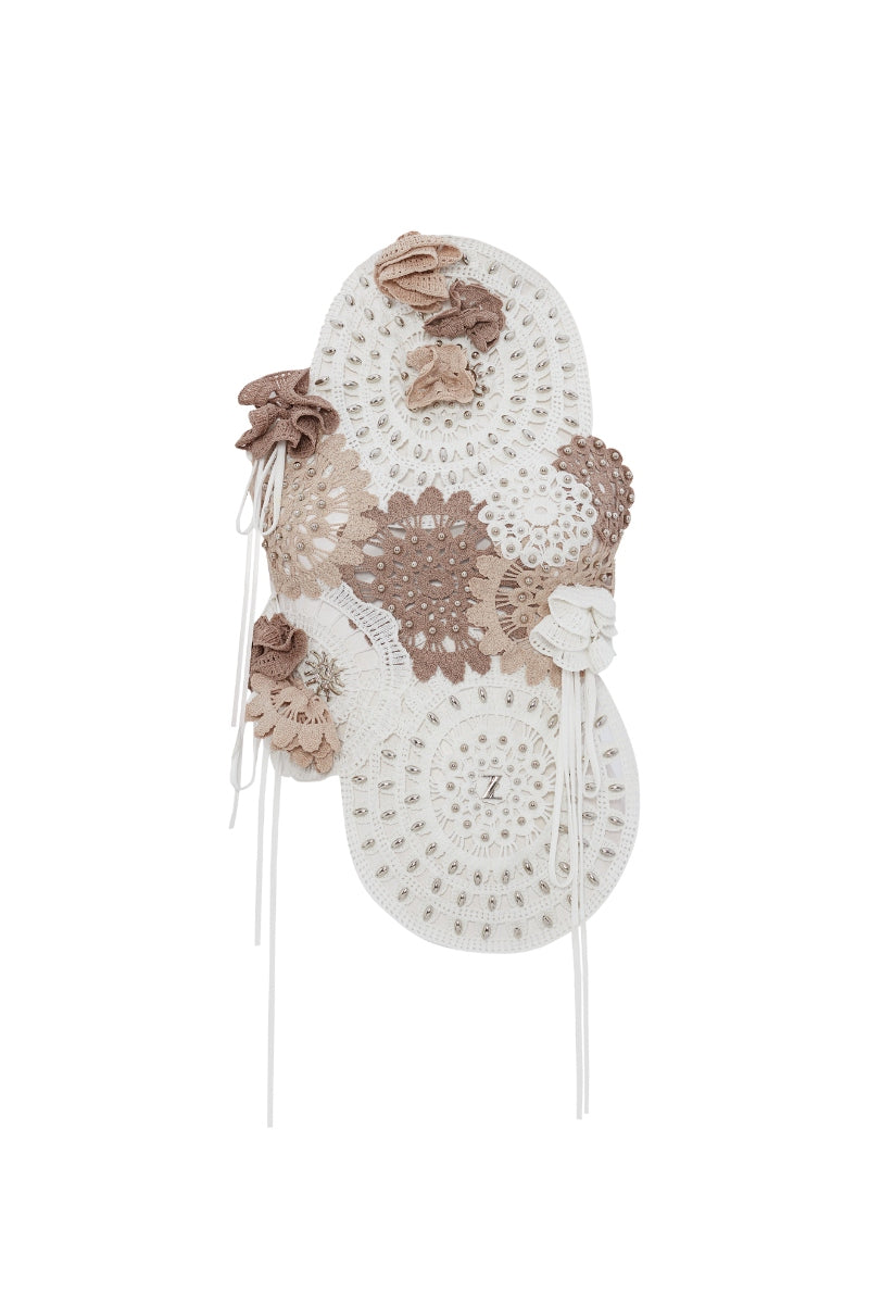 Zeynep Tosun asymmetrical broderie top in off-white, featuring intricate embroidery and a stylish, modern design.
