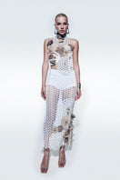 Zeynep Tosun asymmetrical broderie top in off-white with intricate embroidery and elegant design, displayed on a neutral background.