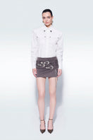 White power collar shirt by Zeynep Tosun featuring a classic design and tailored fit, shown on a model.
