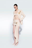Beige basic logo top by Zeynep Tosun, featuring a simple design and soft fabric, displayed on a neutral background.