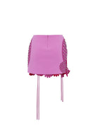 Pink floral mini skirt by Zeynep Tosun, back view showcasing delicate floral pattern and fitted waistband.