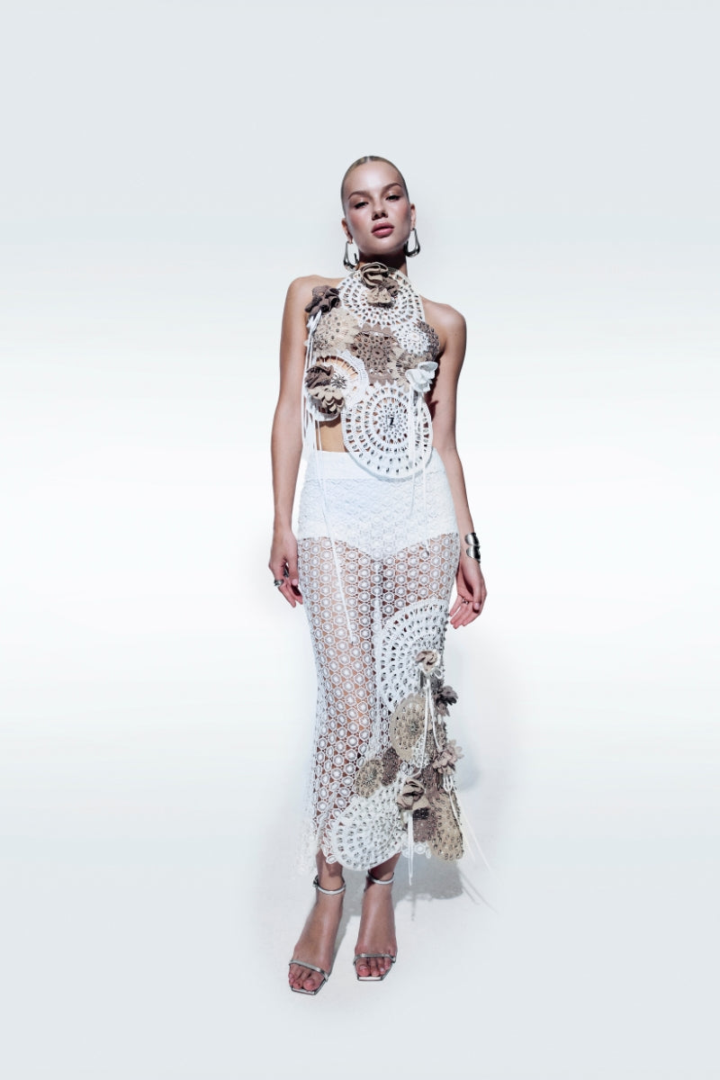 Zeynep Tosun midi length broderie skirt in off-white with intricate embroidery and a flowing design, perfect for elegant wear.