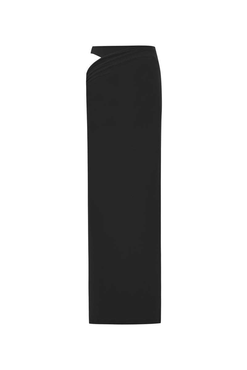 Black draped maxi skirt by Zeynep Tosun, flowing fabric with elegant draping, shown from the back.