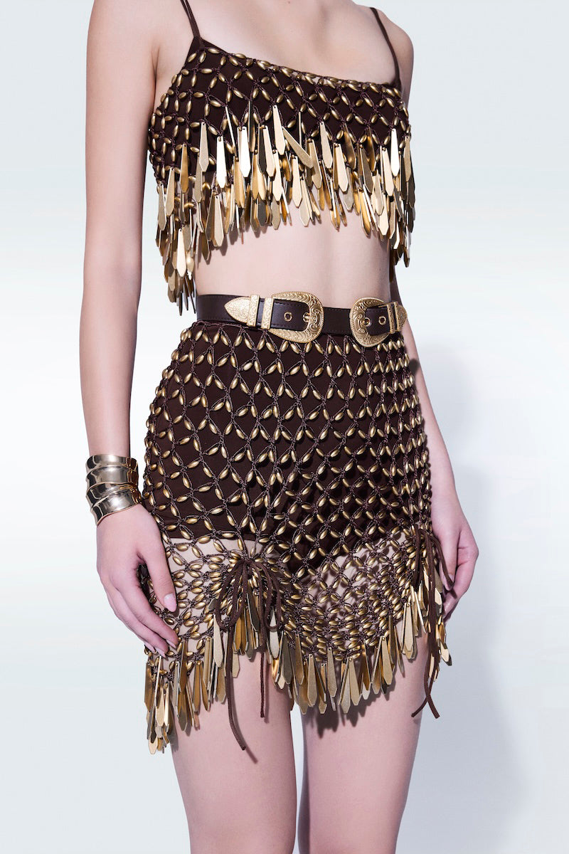 Hand-knit metallic brown mini skirt by Zeynep Tosun, featuring a textured knit pattern and a stylish, fitted silhouette.