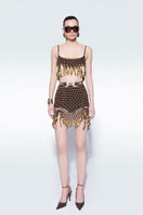 Hand-knit metallic brown mini skirt by Zeynep Tosun, featuring textured knit fabric and a stylish, fitted silhouette.