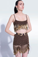 Hand-knit metallic brown mini skirt by Zeynep Tosun, featuring a textured, stylish design perfect for fashion-forward looks.