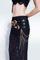 Black lace midi skirt with attached belts by Zeynep Tosun, featuring intricate lace design and stylish belt details.